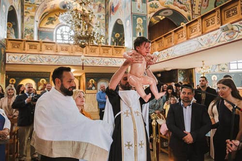 fotograf für orthodoxe taufe baby hoch